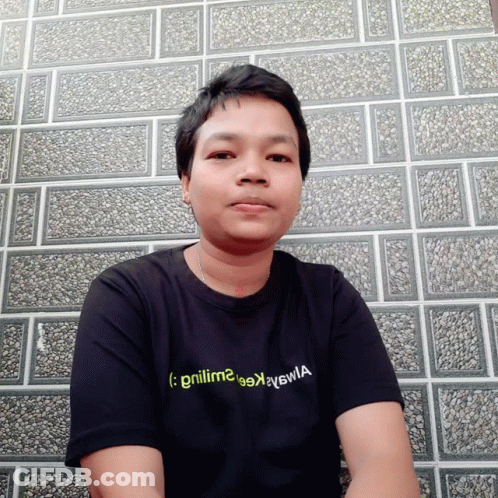 A Man Wearing A Black T-Shirt That Says " Grillima " On It GIF