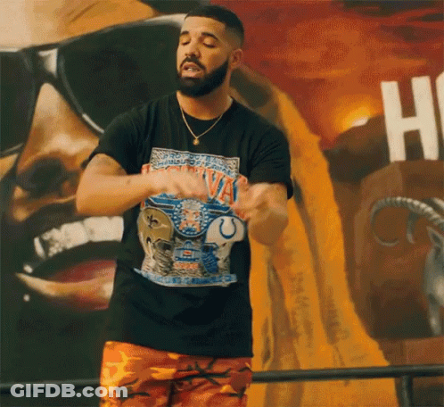 A Man Wearing A Black T-Shirt That Says ' Montana ' On It GIF