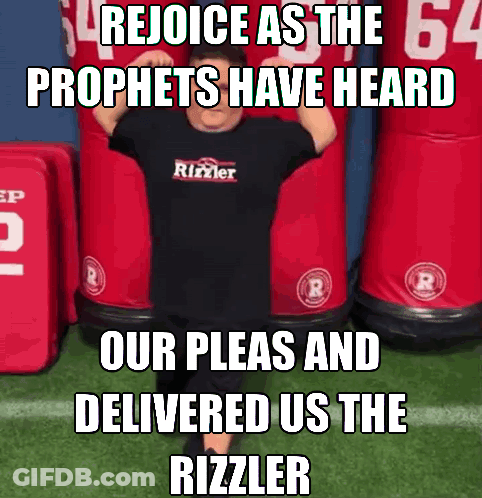 A Man Wearing A Black T-Shirt That Says ' Rejoice As The Prophets Have Heard ' On It GIF