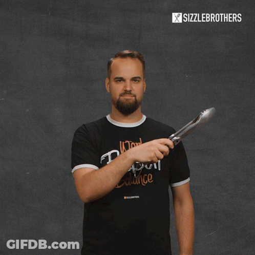 A Man Wearing A Black T-Shirt That Says Work Fleisch Balance GIF
