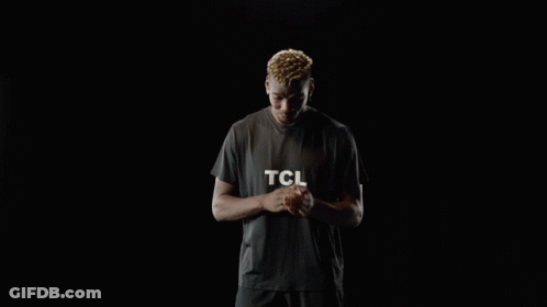 A Man Wearing A Black T-Shirt With The Word Tcl On It GIF