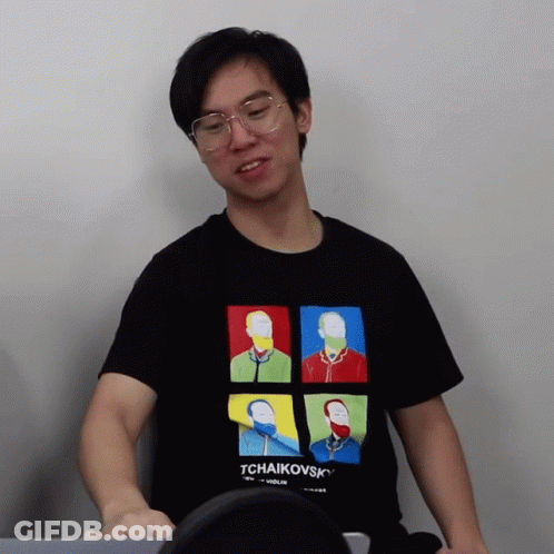 A Man Wearing A Black Tchaikovsky Shirt GIF