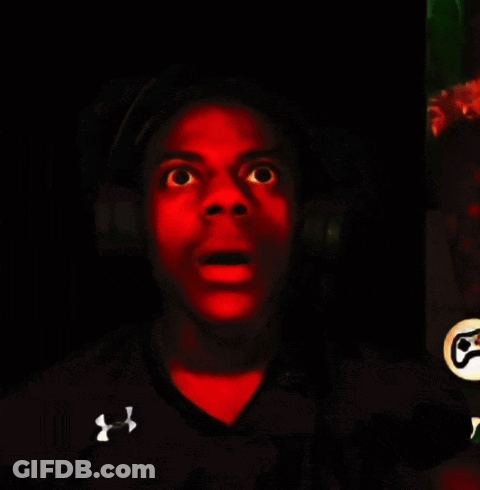A Man Wearing A Black Under Armour Shirt Is Making A Funny Face GIF