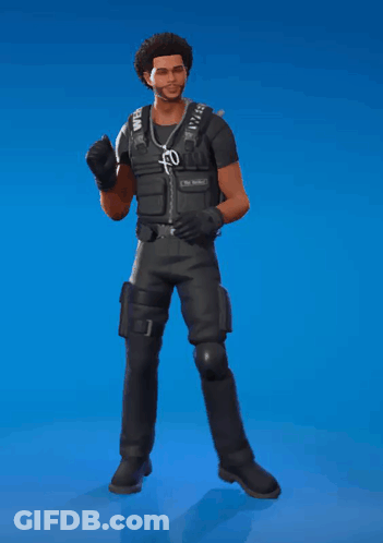 A Man Wearing A Black Vest With A X On It GIF