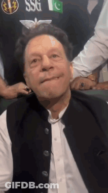 A Man Wearing A Black Vest With The Word Ssg On It Is Making A Face GIF