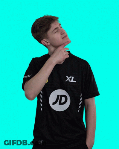 A Man Wearing A Black Xl Jd Shirt Holds His Hand To His Chin GIF