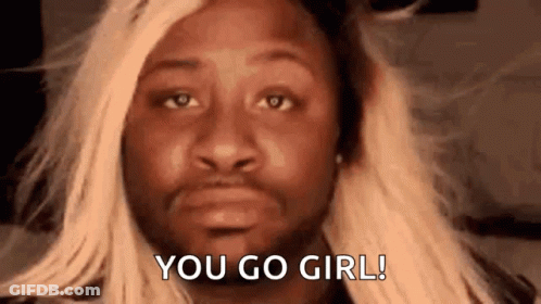 A Man Wearing A Blonde Wig Is Saying `` You Go Girl ! '' GIF