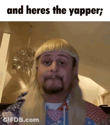 A Man Wearing A Blonde Wig With The Words And Heres The Yapper Written Below Him GIF