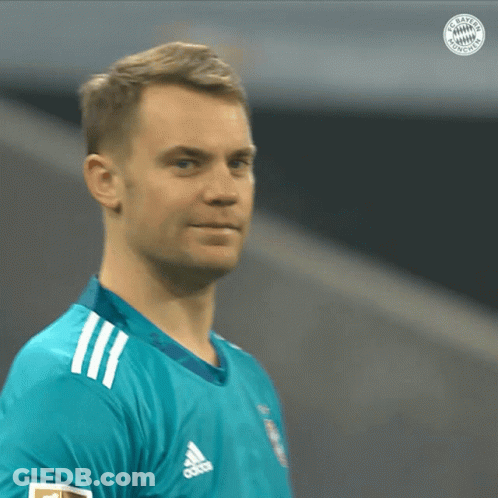 A Man Wearing A Blue Adidas Shirt Looks To The Side GIF