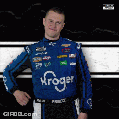 A Man Wearing A Blue And Black Race Suit With Kroger On It GIF