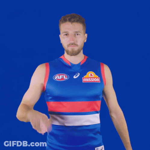 A Man Wearing A Blue And Red Afl Jersey Holds Up His Finger GIF