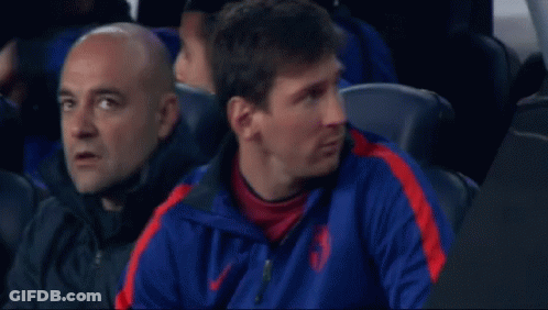 A Man Wearing A Blue And Red Nike Jacket GIF