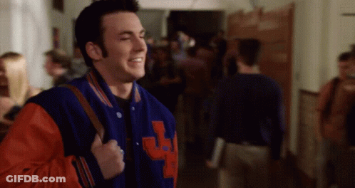A Man Wearing A Blue And Red Varsity Jacket With The Letter J On It GIF