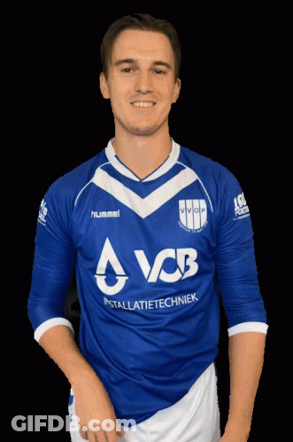 A Man Wearing A Blue And White Hummel Shirt With Avcb Written On It GIF
