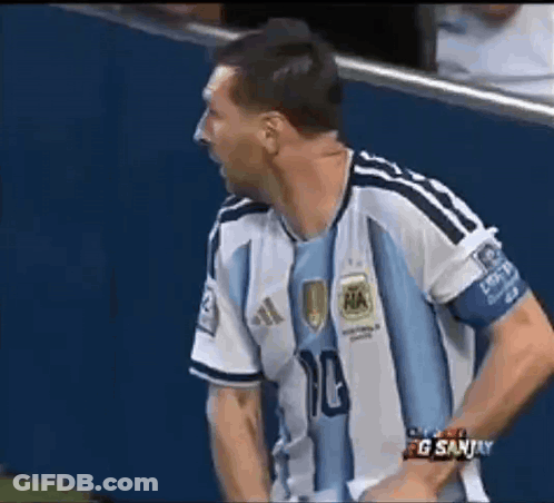 A Man Wearing A Blue And White Soccer Jersey With The Number 10 On It GIF