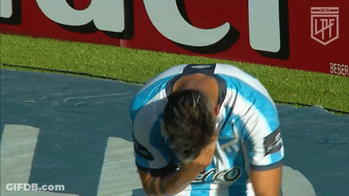 A Man Wearing A Blue And White Striped Shirt With The Number 8 On It GIF