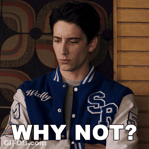 A Man Wearing A Blue And White Varsity Jacket With The Words Why Not On It GIF
