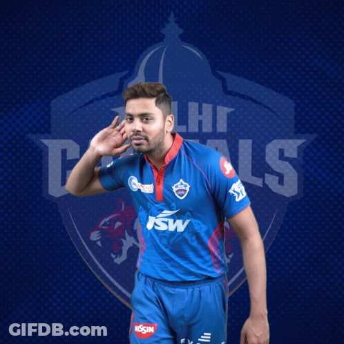 A Man Wearing A Blue Delhi Capitals Jersey GIF