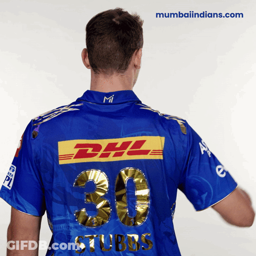 A Man Wearing A Blue Dhl Shirt With The Number 30 On It GIF