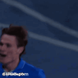 A Man Wearing A Blue Ea7 Msc Shirt Is Giving A Thumbs Up GIF