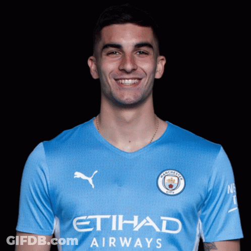 A Man Wearing A Blue Etihad Airways Jersey GIF