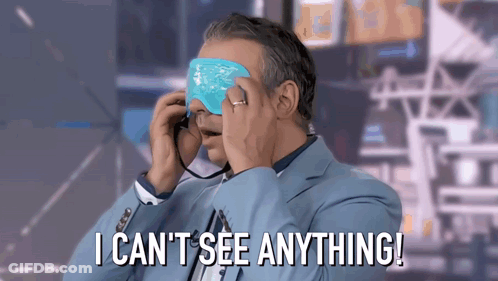 A Man Wearing A Blue Eye Mask With The Words I Can 'T See Anything Written Below Him GIF