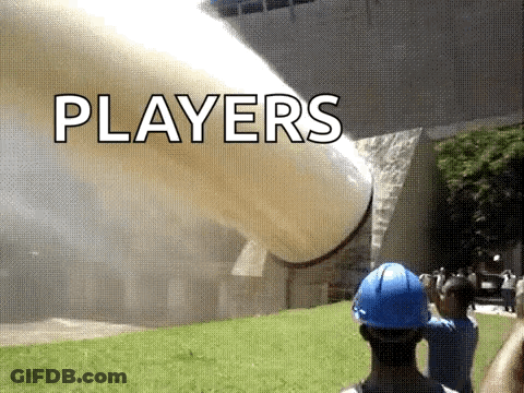 A Man Wearing A Blue Hard Hat Is Standing In Front Of A Large Pipe That Says Players On It . GIF