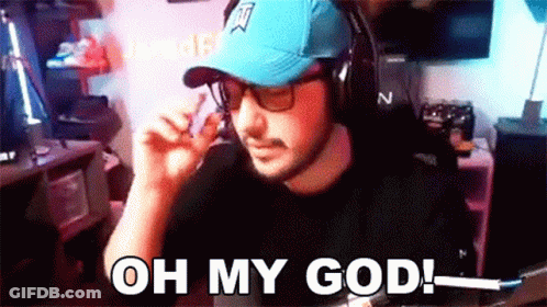 A Man Wearing A Blue Hat And Headphones Says Oh My God GIF
