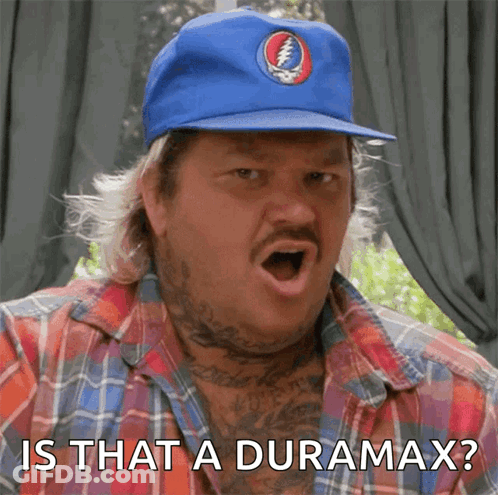 A Man Wearing A Blue Hat With A Grateful Dead Logo On It Says " Is That A Duramax " GIF