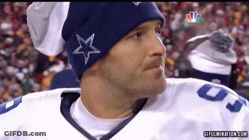 A Man Wearing A Blue Hat With A Star On It And A Cowboys Jersey GIF