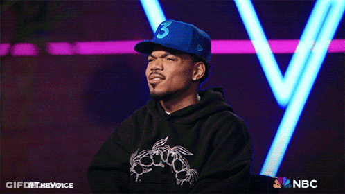 A Man Wearing A Blue Hat With The Number Three On It GIF