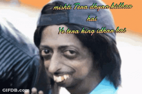 A Man Wearing A Blue Hat With The Words " Mishti Tera Dhyan Kidhan " On It GIF