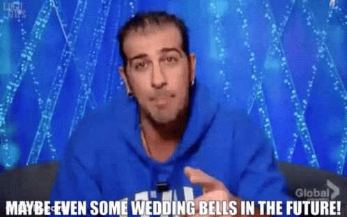 A Man Wearing A Blue Hoodie Says " Maybe Even Some Wedding Bells In The Future " GIF