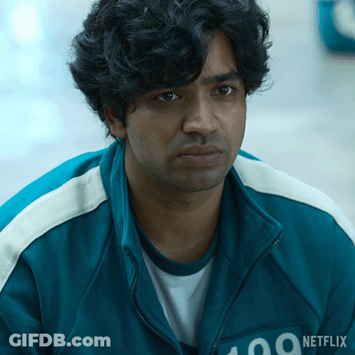A Man Wearing A Blue Jacket That Says 100 On It GIF