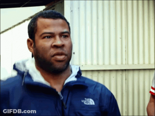 A Man Wearing A Blue Jacket That Says The North Face On It GIF