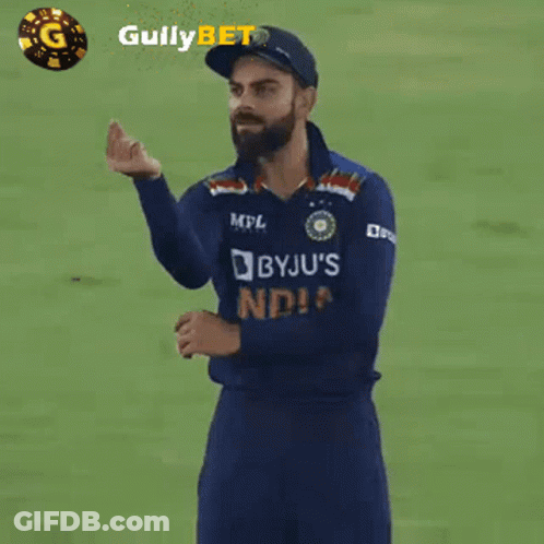 A Man Wearing A Blue Jersey That Says Byju 'S India GIF