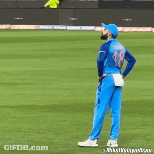 A Man Wearing A Blue Jersey With The Number 18 On It GIF