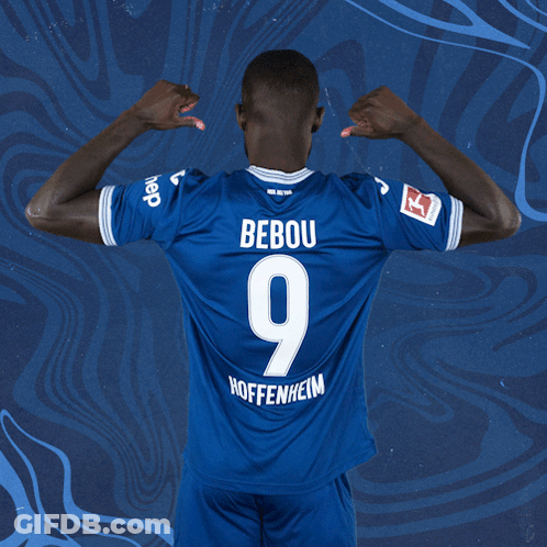 A Man Wearing A Blue Jersey With The Number 9 On The Back GIF