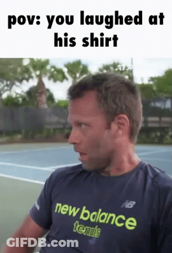 A Man Wearing A Blue New Balance Tennis Shirt GIF