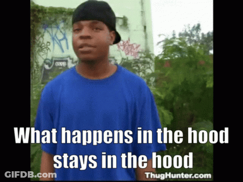 A Man Wearing A Blue Shirt And A Black Hat Says What Happens In The Hood GIF