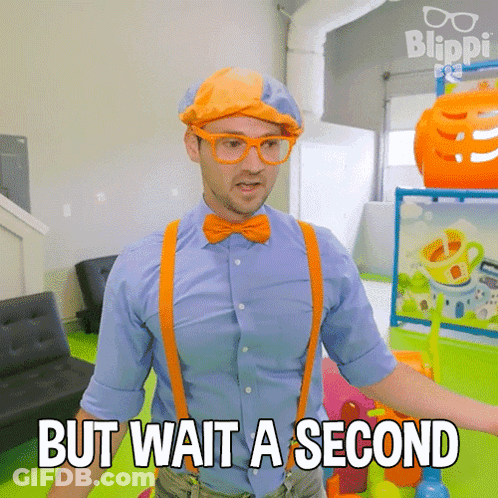 A Man Wearing A Blue Shirt And Orange Suspenders Says " But Wait A Second " GIF