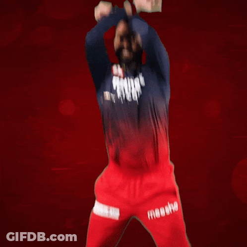 A Man Wearing A Blue Shirt And Red Pants With The Word Moesho On The Side GIF