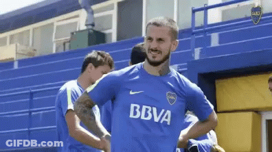 A Man Wearing A Blue Shirt That Says Bbva On The Front GIF
