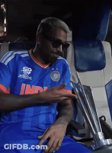 A Man Wearing A Blue Shirt That Says India GIF