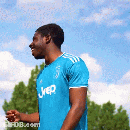 A Man Wearing A Blue Shirt That Says Jeep On The Front GIF