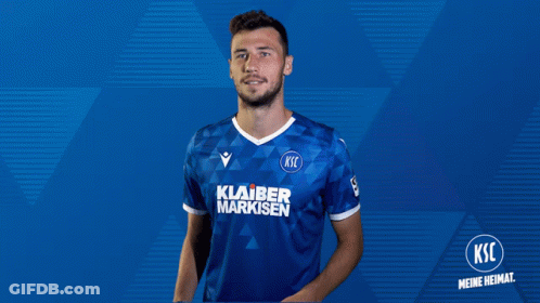 A Man Wearing A Blue Shirt That Says Klarer Markisen On It GIF