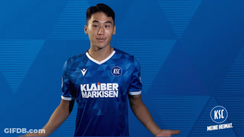 A Man Wearing A Blue Shirt That Says Ksic GIF