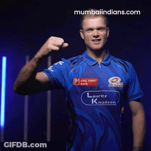 A Man Wearing A Blue Shirt That Says Mumbai Indians GIF
