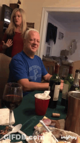 A Man Wearing A Blue Shirt That Says New Toronto Scouts Club GIF