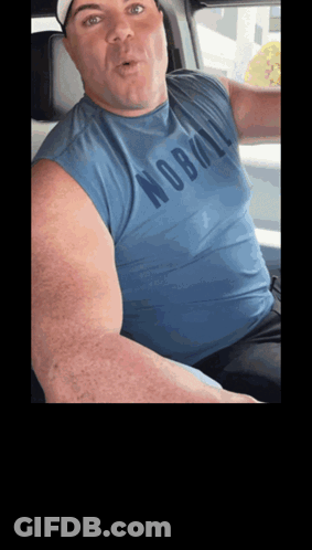 A Man Wearing A Blue Shirt That Says Nobull GIF